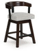 Haddigan - Upholstered Swivel Barstool (Set of 2) - Dark Brown