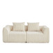 Minimalist Sofa With Curved Lines And Horn Shaped Throw Pillows