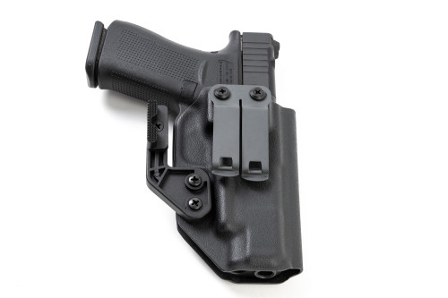 Black Kydex IWB holster with Glock 48 MOS holstered, rear view showing belt clip and attached claw wing