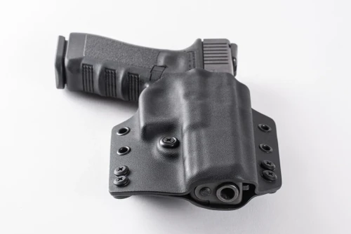 OWB Holster for Glock 20 GEN5, custom Kydex — belt loops and retention detail