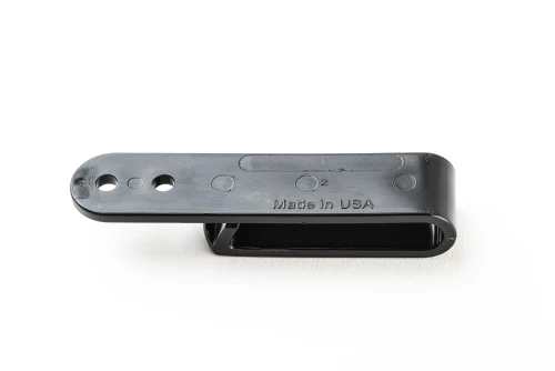 Plastic OWB belt clip for Kydex holsters — installed on belt