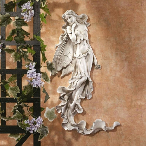 Brianna the Summer Breeze Fairy Wall Sculpture in the Garden