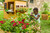 child watering Boldly® Dark Red Geranium plants