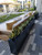 Camoux Narrow Rectangular Planters in Hotel Patio Outdoor Space