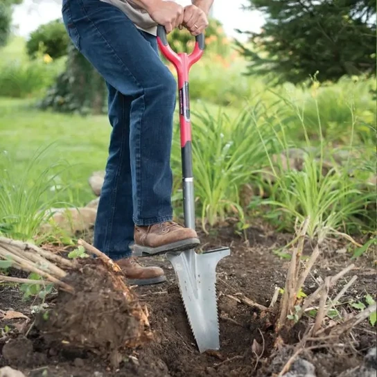 Spade serrated drain spade in use