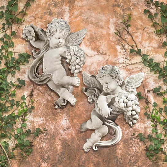 Cherub Harvest Wall Sculptures in the Garden