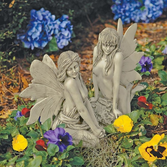 The Enchanted Garden Fairies Sculptures in the garden