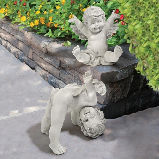 Topsy and Turvey the Cherub Twins Statues in the Garden