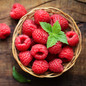 Nova Red Raspberry fruit in basket Nova Red Raspberry fruit in basket