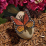 Butterfly on Rock Statue Monarch In The Garden