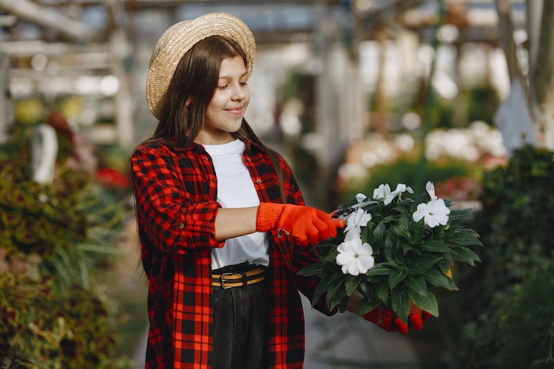 girl-pruning-flowering-annual.jpg