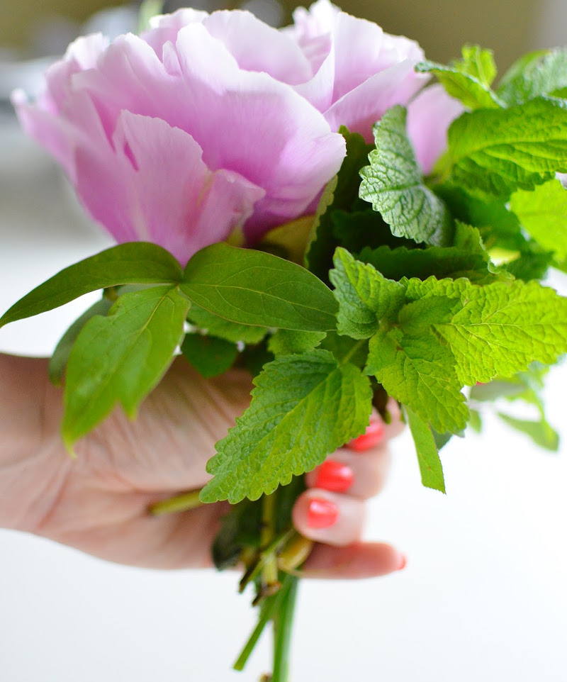 holding-cut-flowers-to-tie-into-an-arrangement.jpg