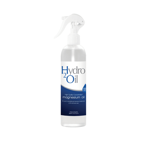Caronlab Australia Hydro 2 Magnesium Oil 250ml professional recovery oil Gold Coast Brisbane Australia Wide, Magnesium oil spray for massage and wellness treatments, Beauty therapist applying magnesium oil after pedicure or waxing service, Professional skin conditioning magnesium oil trigger bottle, Profile Salon Supplies Caronlab Hydro 2 Magnesium Oil packaging Gold Coast Brisbane Australia Wide