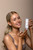 Vani-T Australia Face Base Glazing Milk 100g professional makeup primer Gold Coast Brisbane Australia Wide, Glowing skin preparation product for makeup artists, Beauty therapist applying luminous face base before makeup, Hydrating glazing milk for radiant complexion, Profile Salon Supplies Vani-T Face Base Glazing Milk