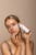 Vani-T Australia Face Base Glazing Milk 100g professional makeup primer Gold Coast Brisbane Australia Wide, Glowing skin preparation product for makeup artists, Beauty therapist applying luminous face base before makeup, Hydrating glazing milk for radiant complexion, Profile Salon Supplies Vani-T Face Base Glazing Milk