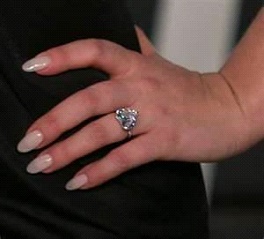 Her heart shaped engagement ring