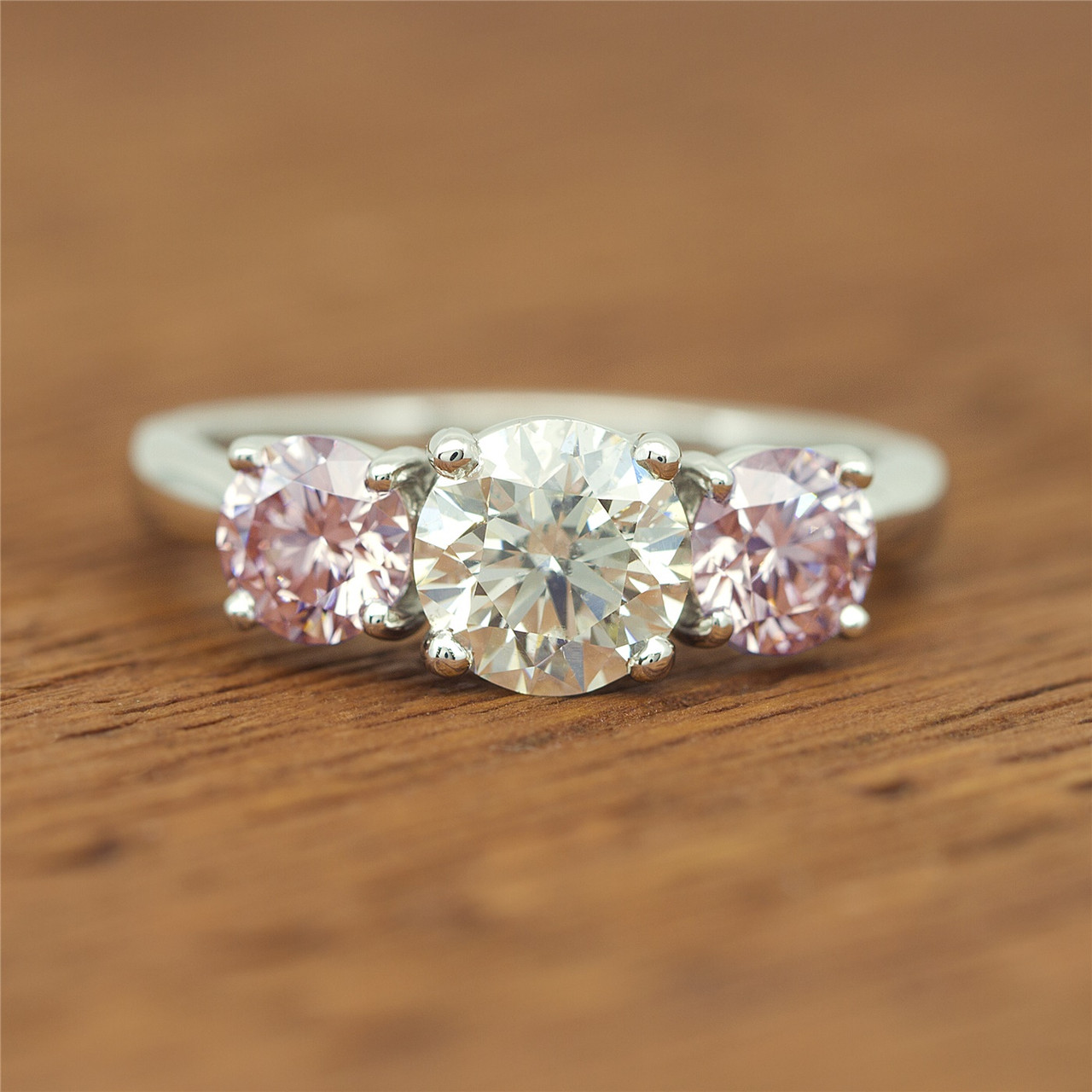 Custom-made Pink Diamond, White Diamond Platinum 3 Stone Ring