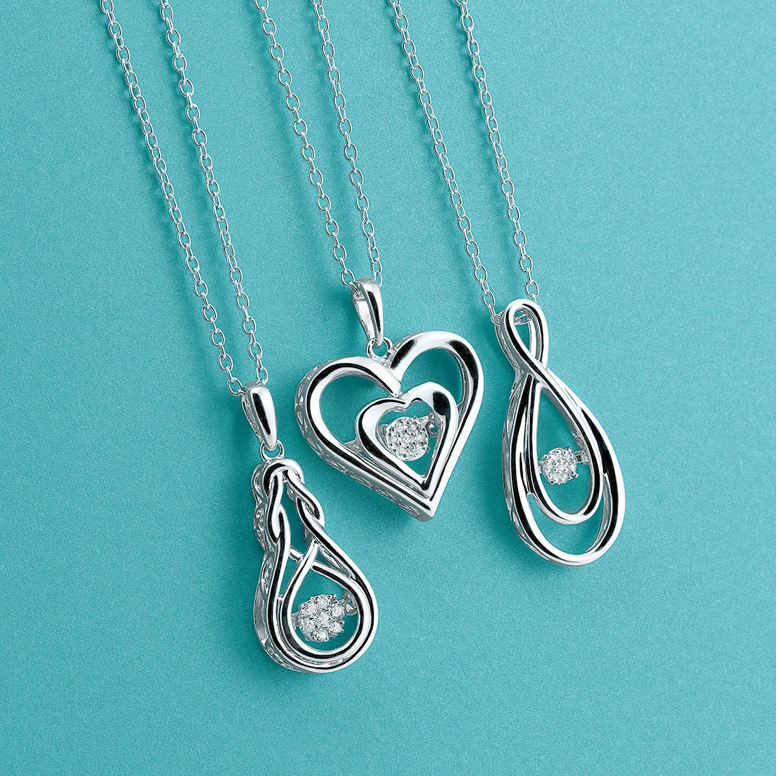 Rhythm of Love Sterling and Diamond Necklace - Love Knot Style