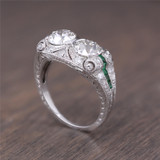 Vintage Platinum Diamond and Emerald Toi Et Moi Ring