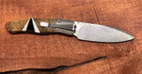 Damascus Steel Woolly Mammoth Bone Titanium Knife