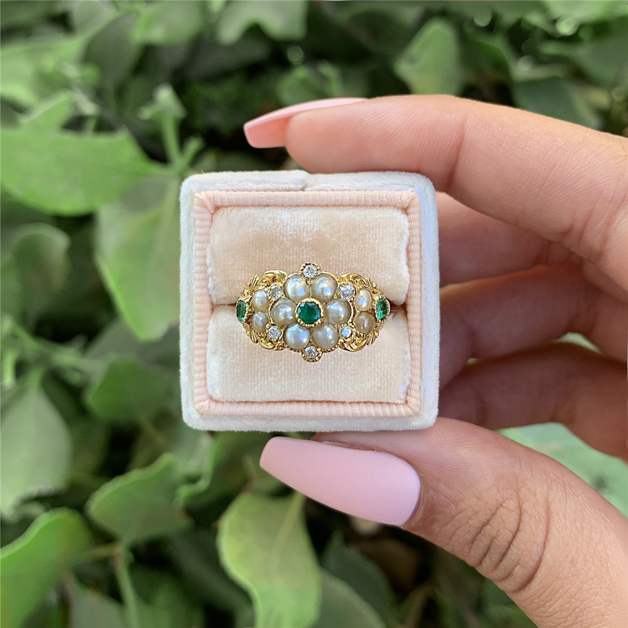 Antique Emerald & Seed Pearl Ring crafted in 14k Gold. Circa 1890s.