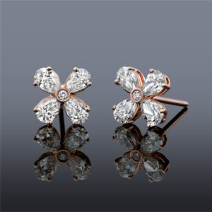 14k Rose Gold and Pear Shaped Diamond Studs 14k Rose Gold and Pear Shaped Diamond Studs