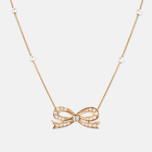 14K Yellow Gold Seed Pearl Bow Stationary Pendant 14K Yellow Gold Seed Pearl Bow Stationary Pendant