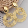 Sculptural round statement drop earrings