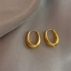 Oval Sculptural Hoop Earrings in Gold Tone