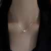Two pearl pendant necklace in silver tone