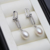 White freshwater pearl drop earrings in sterling silver