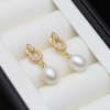 Freshwater pearl drop earrings in gold tone