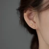Silver tone flower earrings product view
