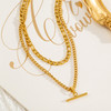 Silver tone layered necklace detail