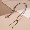Silver tone geometric rope necklace detail