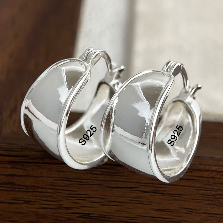 Sterling silver wide hoop earrings detail
