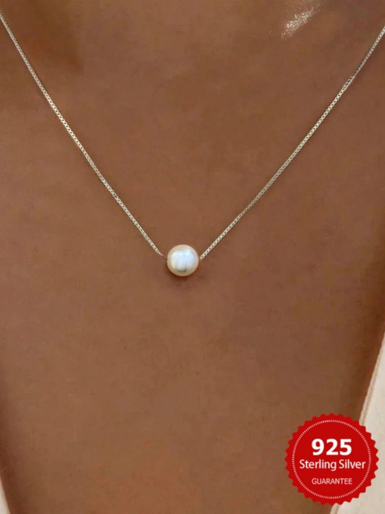 Silver tone mother of pearl necklace detail