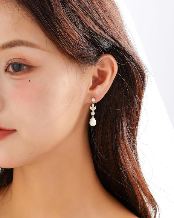 Silver tone pearl drop earrings product view