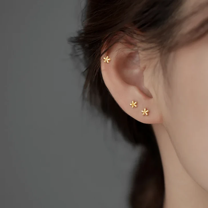 Silver tone flower earrings product view