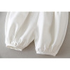 OONA 2 PCS Baptism White Satin Suit with Hat, close-up of silky white satin baby outfit with elasticated cuffs.