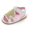 Generic Christmas Sandals Silver Gold Tree Non-Slip Sole, children's sandal with white straps, gold glittery tree decoration, pink interior, and brown non-slip sole.