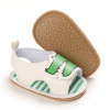 Generic Soft Sole Cartoon Printed Sandals in White, baby sandals featuring a playful dinosaur design on the strap and green and white striped inner sole.