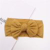 Generic Baby Top Knot Bow Headband, tan ribbed fabric headband with a large bow for infants and toddlers.