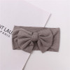 Generic Baby Top Knot Bow Headband, grey ribbed fabric baby headband with large bow design.