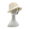 Generic Winter Bucket Hats Ear Flaps, quilted cream-colored winter bucket hat with ear flaps and chin strap on a white display bust.