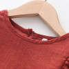 Generic Firebrick Ruffled Long Sleeve Romper Bodysuit, close-up of the product with a detailed view of the ruffled long sleeves and neckline.