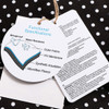 Minnie Me Stroller Bag Winter Windproof Sleeping Bag, product tag and instructions showing waterproof and windproof features with layered fabric and insulation for cold weather.