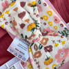 Generic Floral Layette Set 4 Pieces, baby clothing with colorful floral pattern on soft fabric.