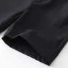 OONA Mike Short Suite Suspender, close-up view of the black fabric of the suit's hem.