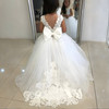 White sleeveless satin flower girl dress with princess-inspired styling